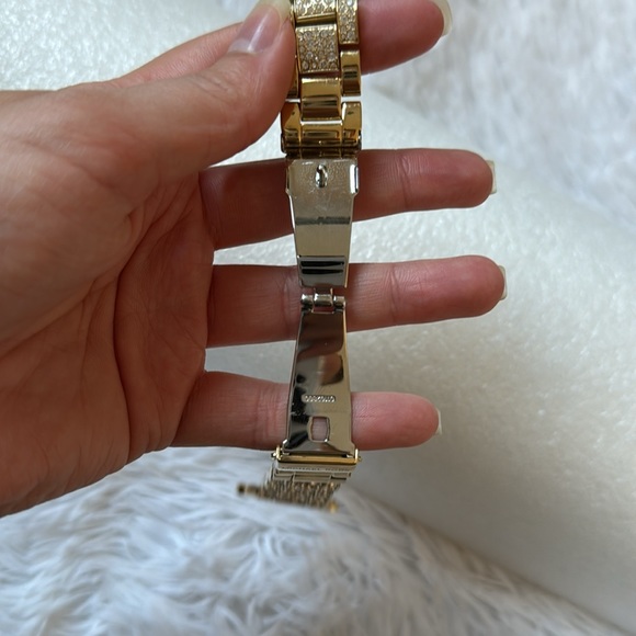 Michael Kors Apple Watch Goldtone Stainless Steel & Crystal
Bracelet - Picture 12 of 14